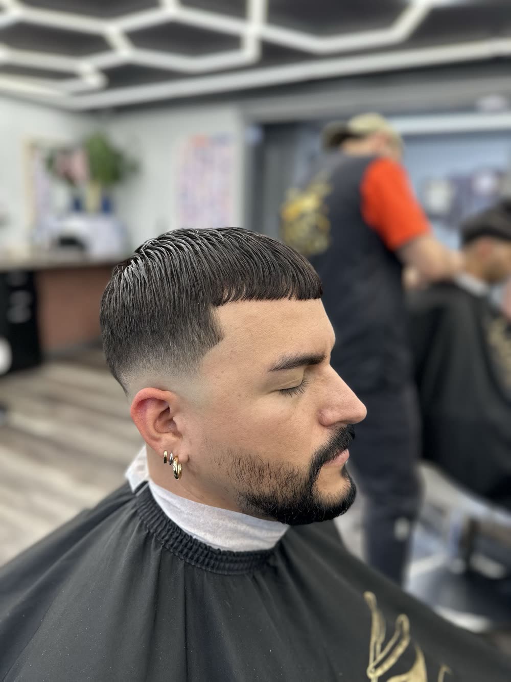Skin fade with a shaped beard