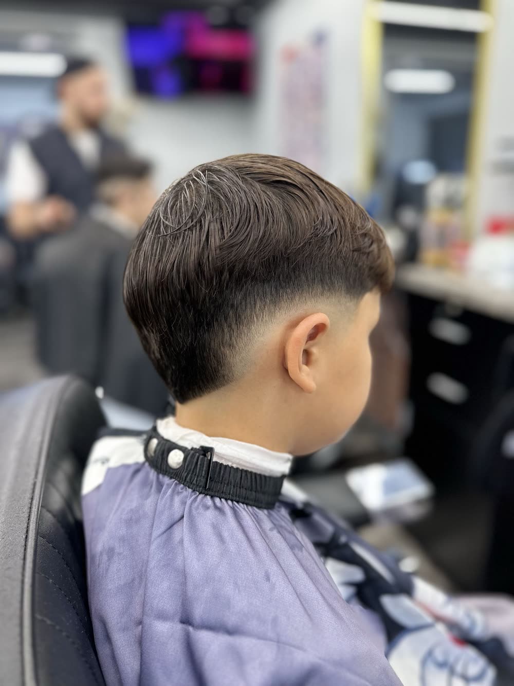 Side-profile fade with a hair design